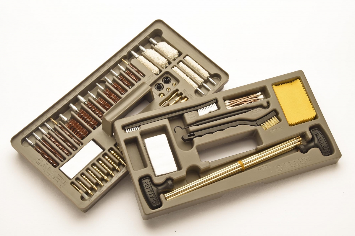 The two trays of the kit, hosting its wide selection of cleaning tools