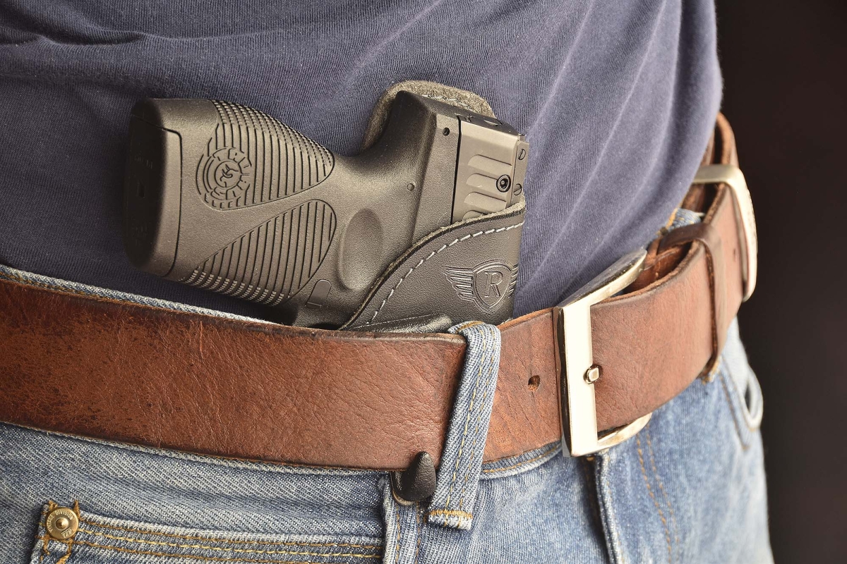 The outer beak on the lower portion of the belt clip will securely fasten the holster to the belt for quick and secure drawing