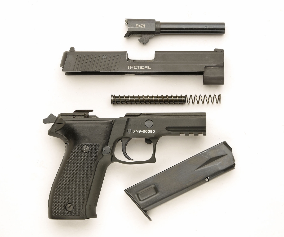 The S.D.M. XM9 semi-automatic pistol, field-stripped