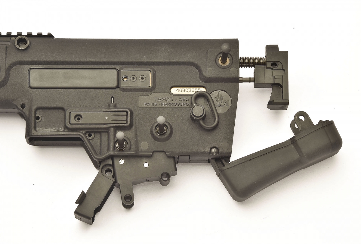 All it takes to field-strip the X95 is the removal of three passing pins: one holds the buttpad in place, the others allow the removal of the hold-open lever and the release of the trigger group
