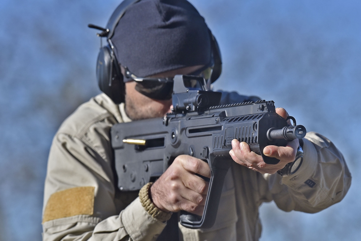 All key components in a bullpup rifle is located within the stock, and that's where spent cases come out from as wekk