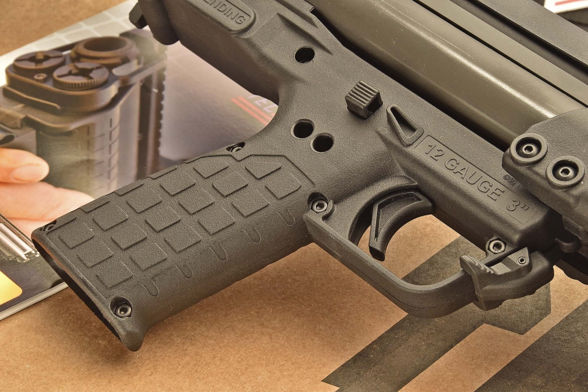 Two holes on the pistol grip allow the pins to be kept in place upon field-strip so they won't be lost. 