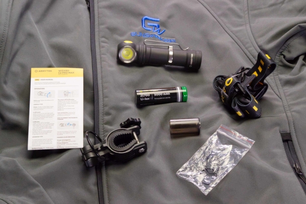 Armytek Wizard C2 Pro Max Magnet USB flashlight The Armytek Wizard C2 Pro Max with instruction leaflet, head band, included battery, 18650 adapter, spare o-rings and the bracket for mounting on a bycicle