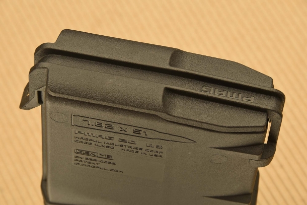 The protection cover of a 7.62x51mm NATO magazine, closed