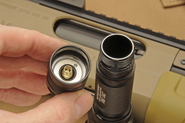 The battery compartment accepts one single 18650 battery or two CR123