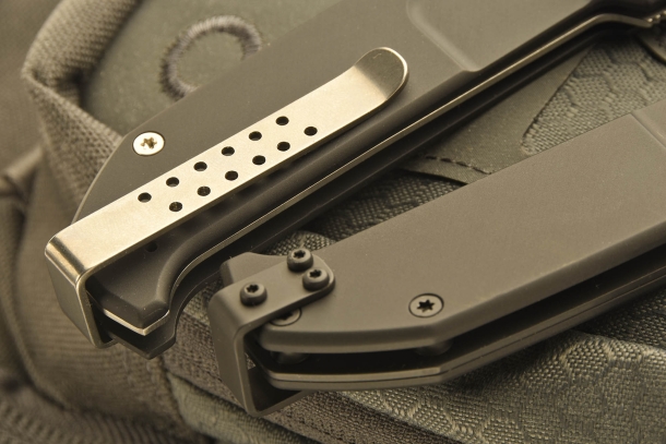 The different sides of the belt clip, installed on the grip by Allen screws