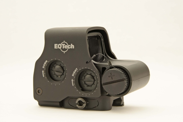 ...showing the windage and elevation dials, and the battery compartment plug