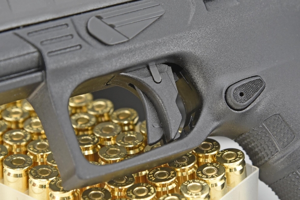 A close-up of the trigger safety on the Beretta APX Combat