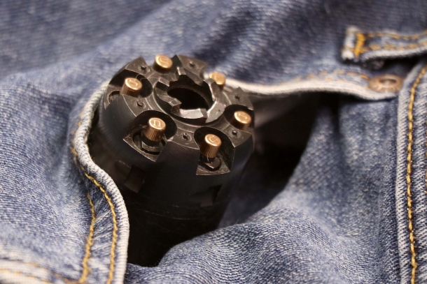 A loaded and capped cylinder: one can easily see how unwise carrying one this way could be. Also, should it fall, it could be as dangerous as a grenade