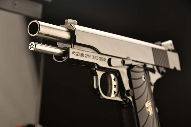 A close-up of the typical star engraved on front of the guide rod of all Cabot Guns 1911s