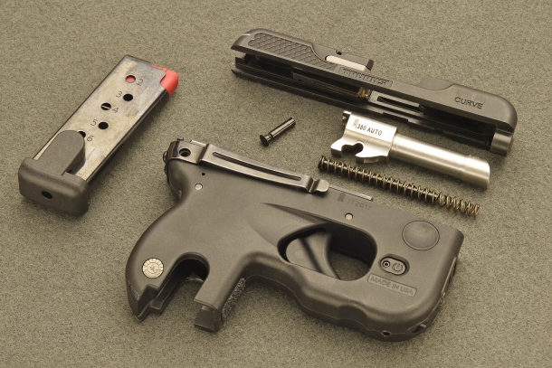 The Taurus 180 Curve pistol, field-stripped
