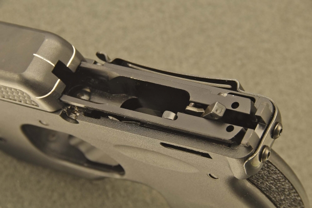 A detail of the frame, with the slide partially removed from its rails