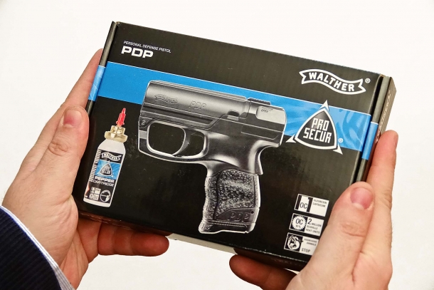 The Walther PDP ships in a cardboard box, with an OC spray cartridge and instructions
