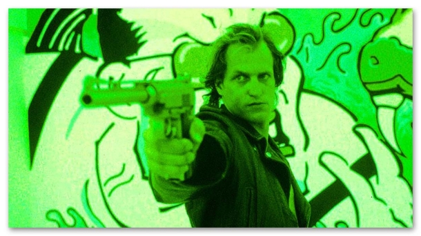 Wildey Survivor pistol: the first, the great, the original Wildey Survivor e Woody Harrelson (Natural Born Killers, 1994)