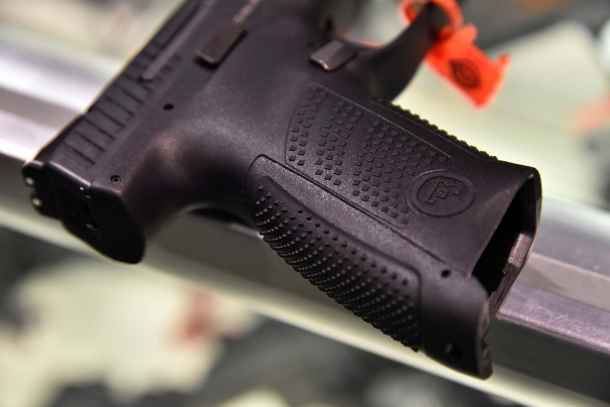 The aggressive texture of the CZ P10C's grip