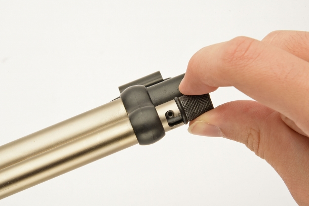 The loading process starts by rotating and unblocking the magazine follower