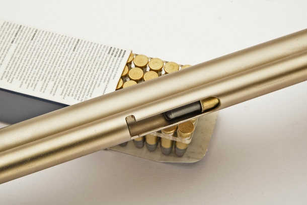Extracting the magazine follower exposes the cartridges' loading window