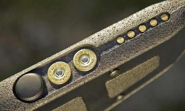 At top of the stock we find room for the cleaning kit (supplied), two 12 gauge shotshells and five .22 caliber cartridges