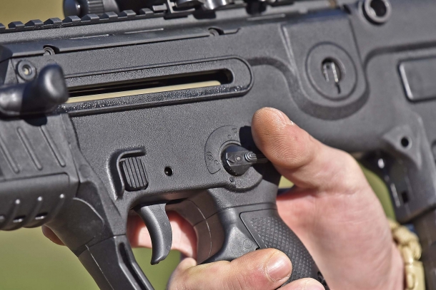 The manual safety, at easy trigger reach
