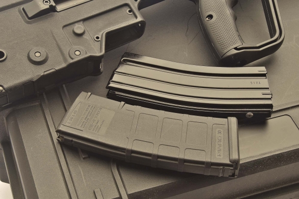 The X95 feeds through STANAG 4179 compliant AR-15 type magazines: hereby portrayed are a standard metal STANAG magazine and a polymer MagPul PMAG