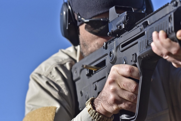 Unlike in conventional firearms, exhaust gases in a bull-pup rifle vent through the stock and out from the ejection window, very close to the shooter's face