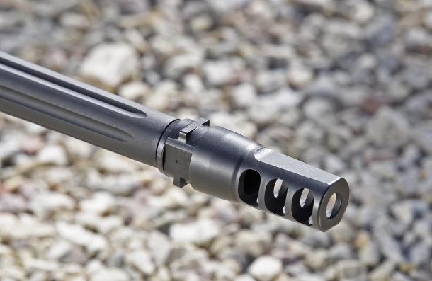 The medium bull barrel is threaded and mounts a SilencerCo Saker Trifecta muzzle brake