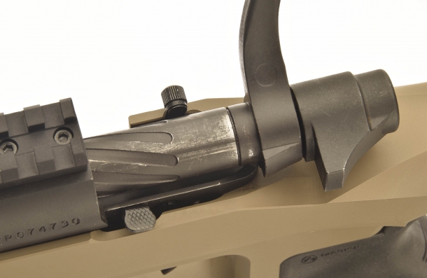 at bottom left: the bolt unlocking button
