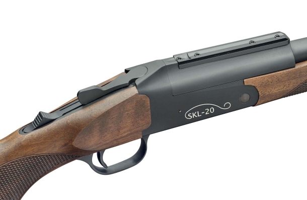 Sabatti SKL-20 "kipplauf" hunting rifle A slider button at top of the grip allows to manually cock or decock the hammer, allowing the safe transport of the rifle with a chambered round