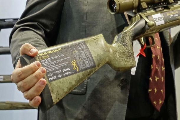The X-Bolt Hell's Canyon Long Range McMillan rifle sports an A-TACS AU Arid-Urban camouflage finish