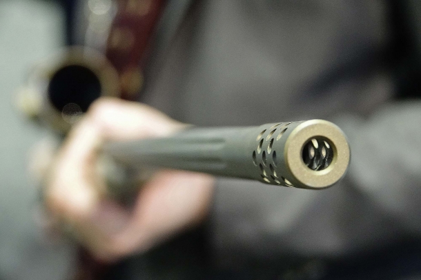 The fluted barrel is equipped with a muzzle brake installed on a threaded muzzle