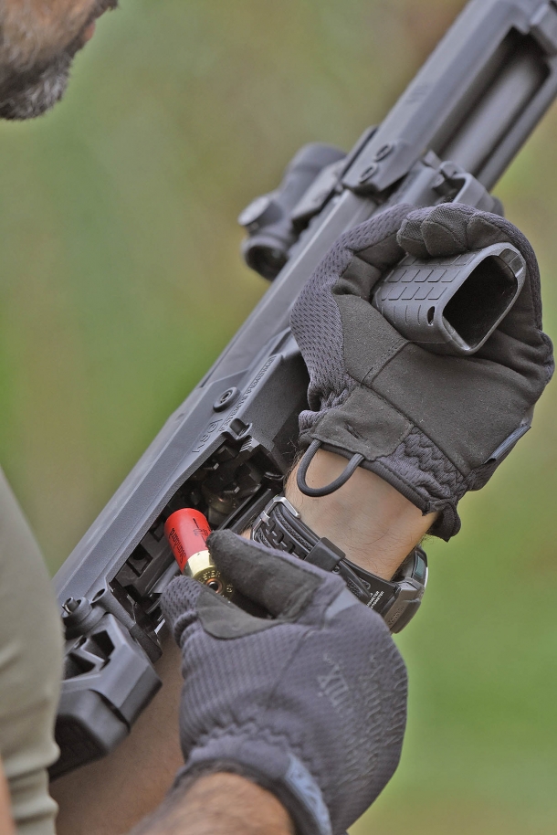 The single window that dubs both as a loading and ejection port is located under the stock