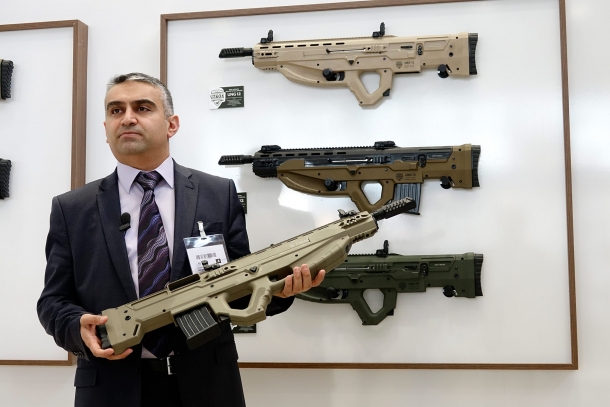 Ayhan Sekitaş, deputy director for Uzkon, showcases the UNG-12 at IWA