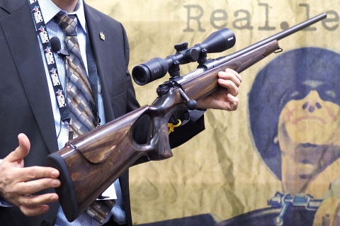 The stock is made out of robust laminated wood, with a thumbhole style pistol grip